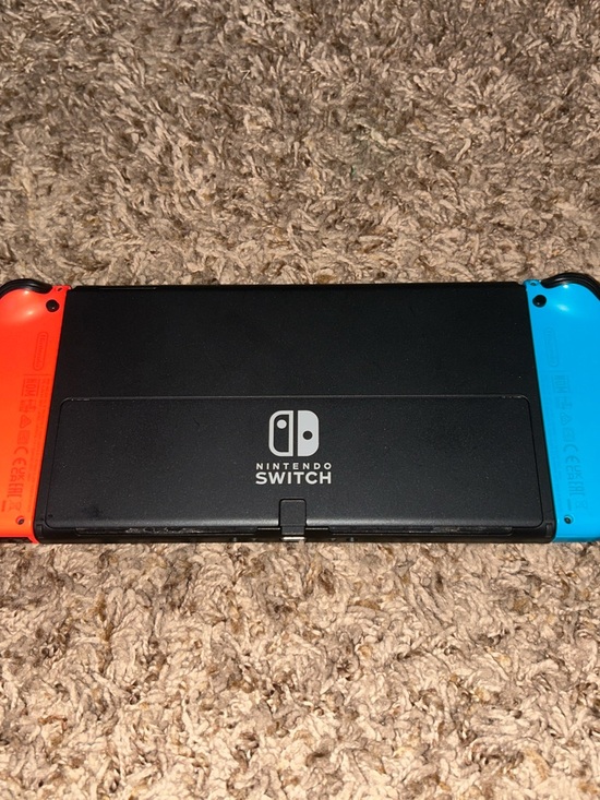 Nintendo Switch with Neon Blue Left & Neon Red Right Joy-Con